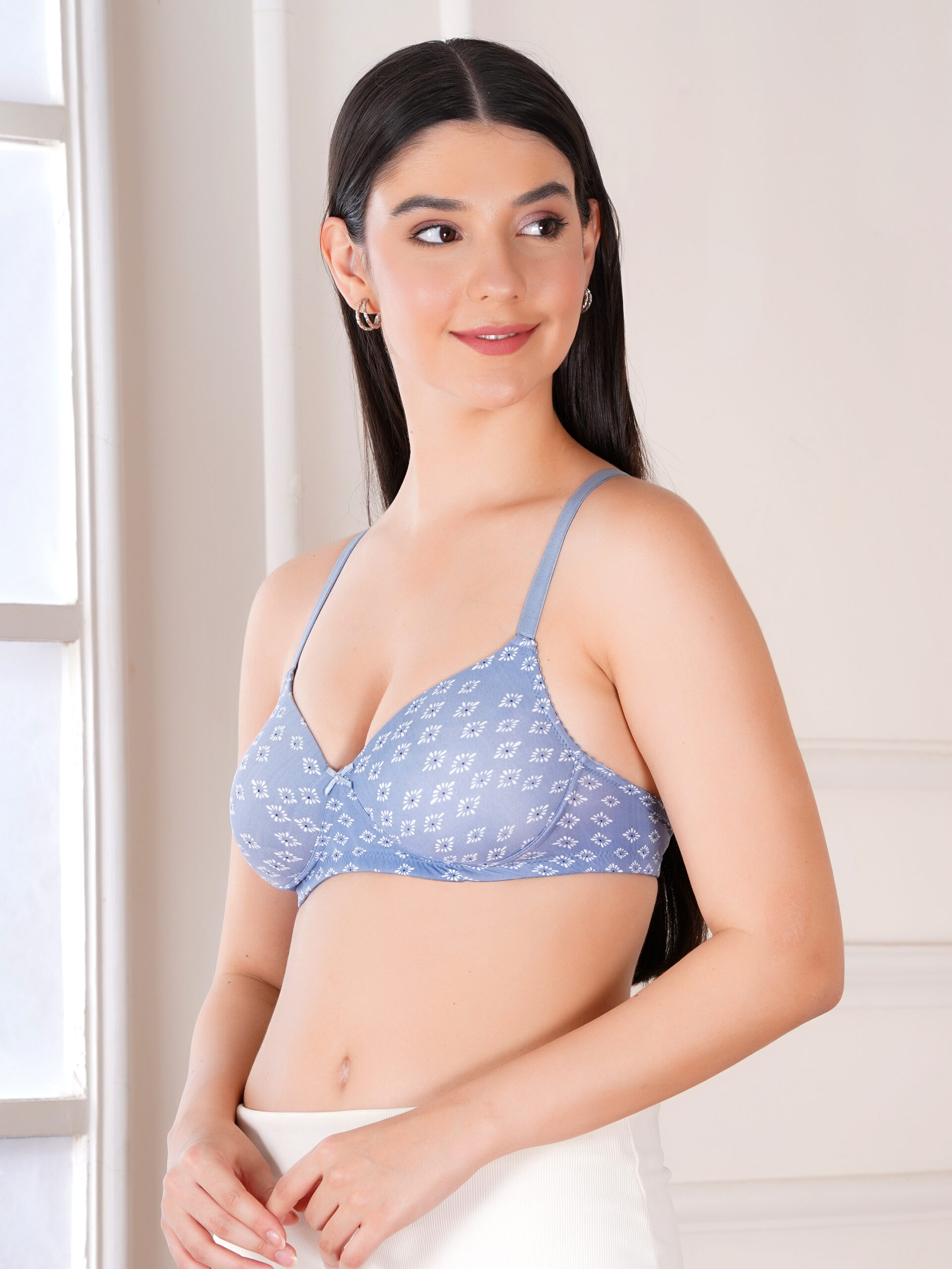Side view of blue floral printed padded wirefree cotton bra for women