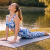 High waist gym pants with mobile pocket for women in sky blue camo worn during yoga stretch