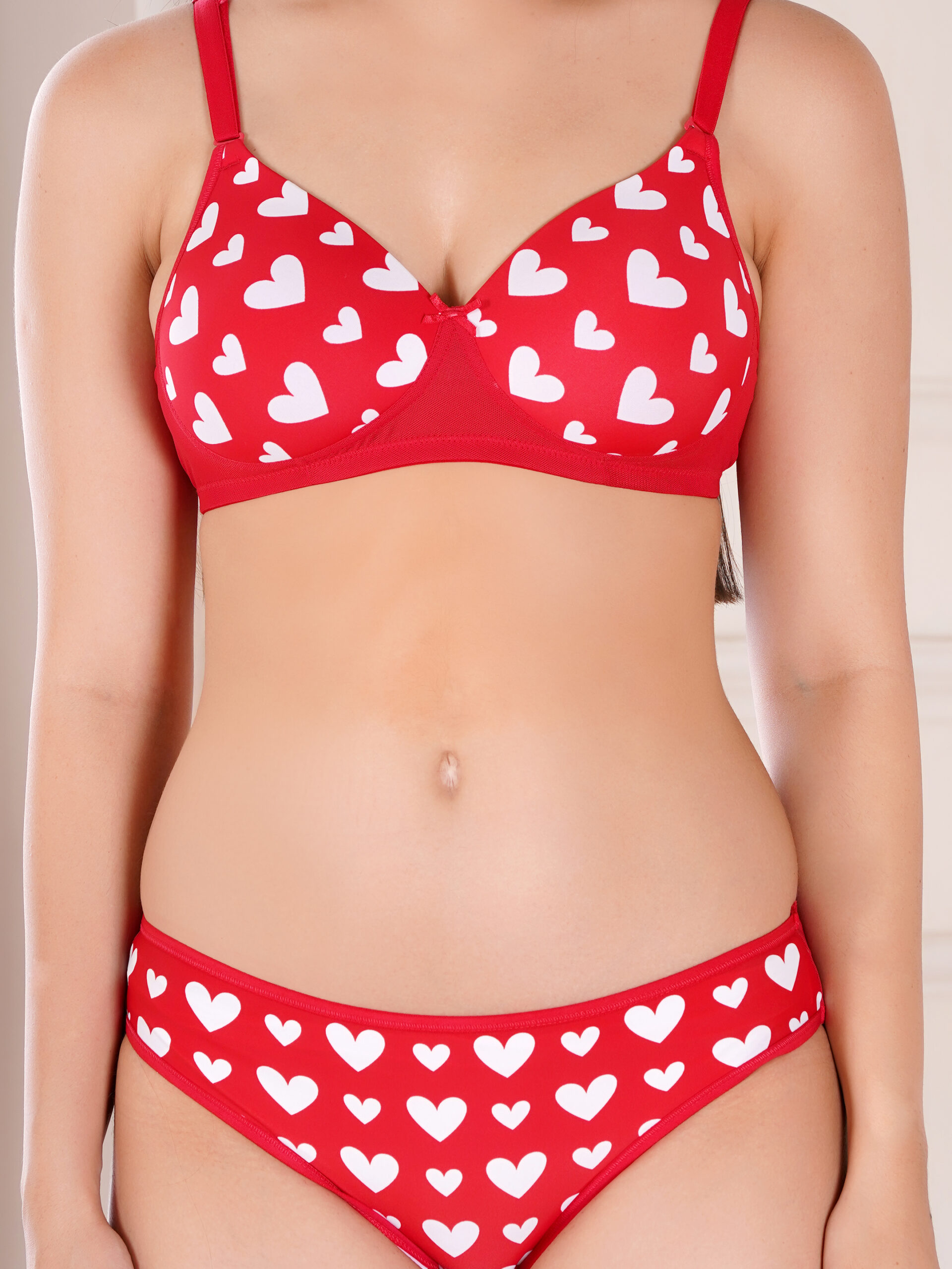 Red heart print padded wirefree bra close up showing fabric and print